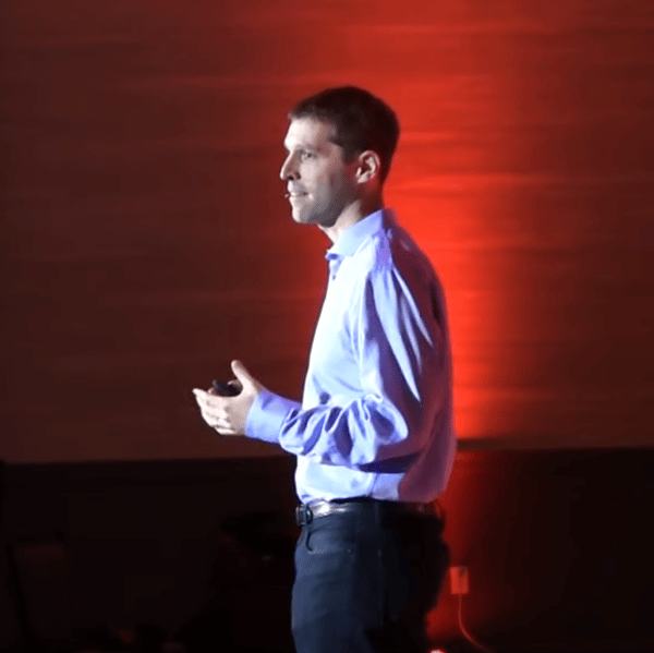 Robert Glazer speaks on stage at TEDxKenmoreSquare