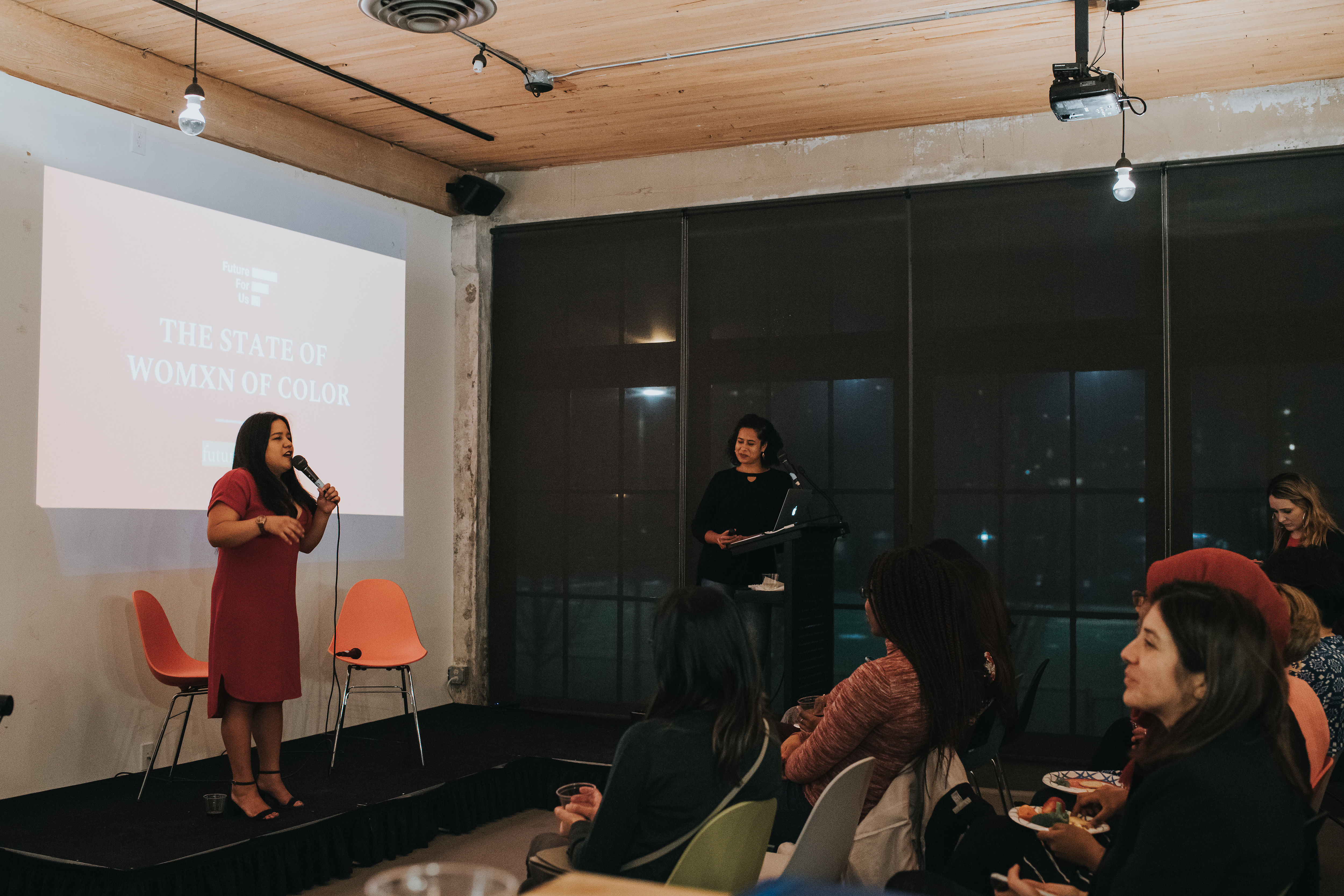 Sage Quiamno and Aparna Rae onstage speaking to women of color. Photo by Anthony Smith.